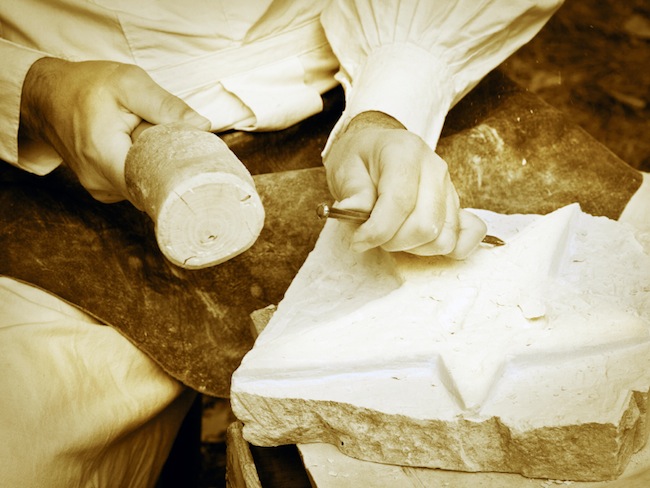 Image of star being carved out of stone